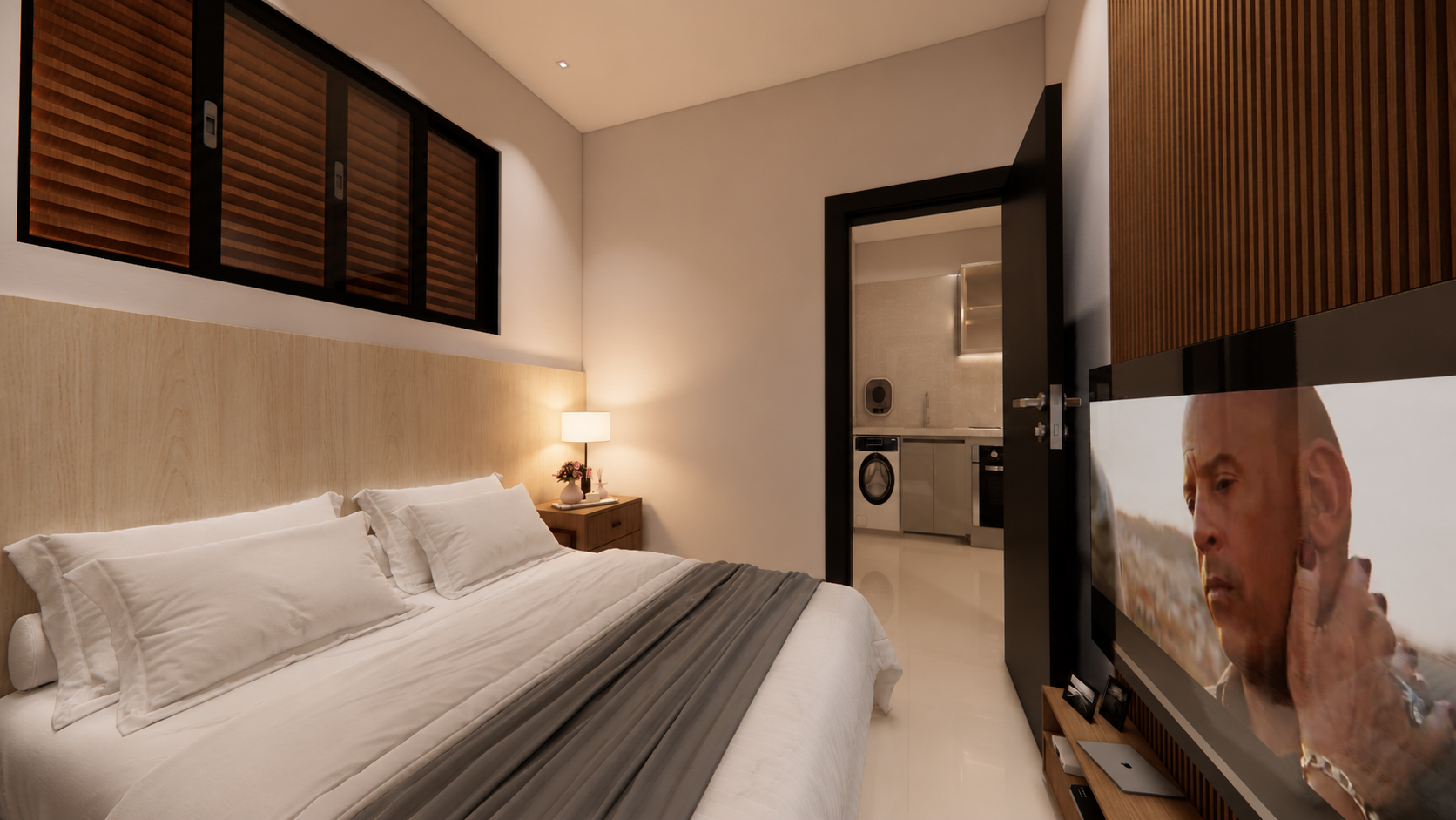 Dormitorio com cama de casal e acesso ao banheiro e a area de servico